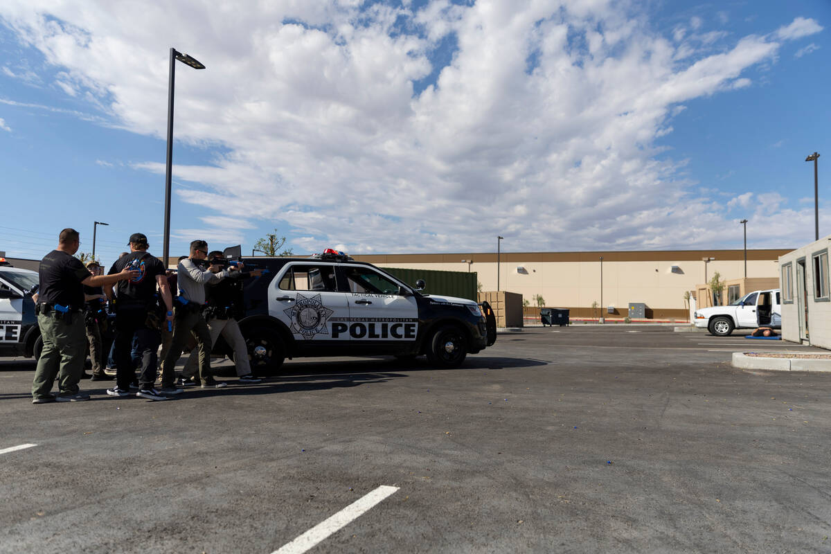 Las Vegas police officer participate during a down citizen rescue scenario at the Reality Based ...