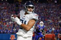 Tennessee Titans tight end Austin Hooper (81) catches a pass during the first half of an NFL fo ...