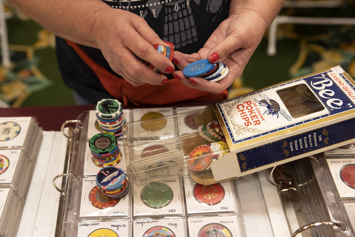 Wendy Schultz sorts vintage poker chips during a memorabilia show at the Gold Coast hotel-casin ...