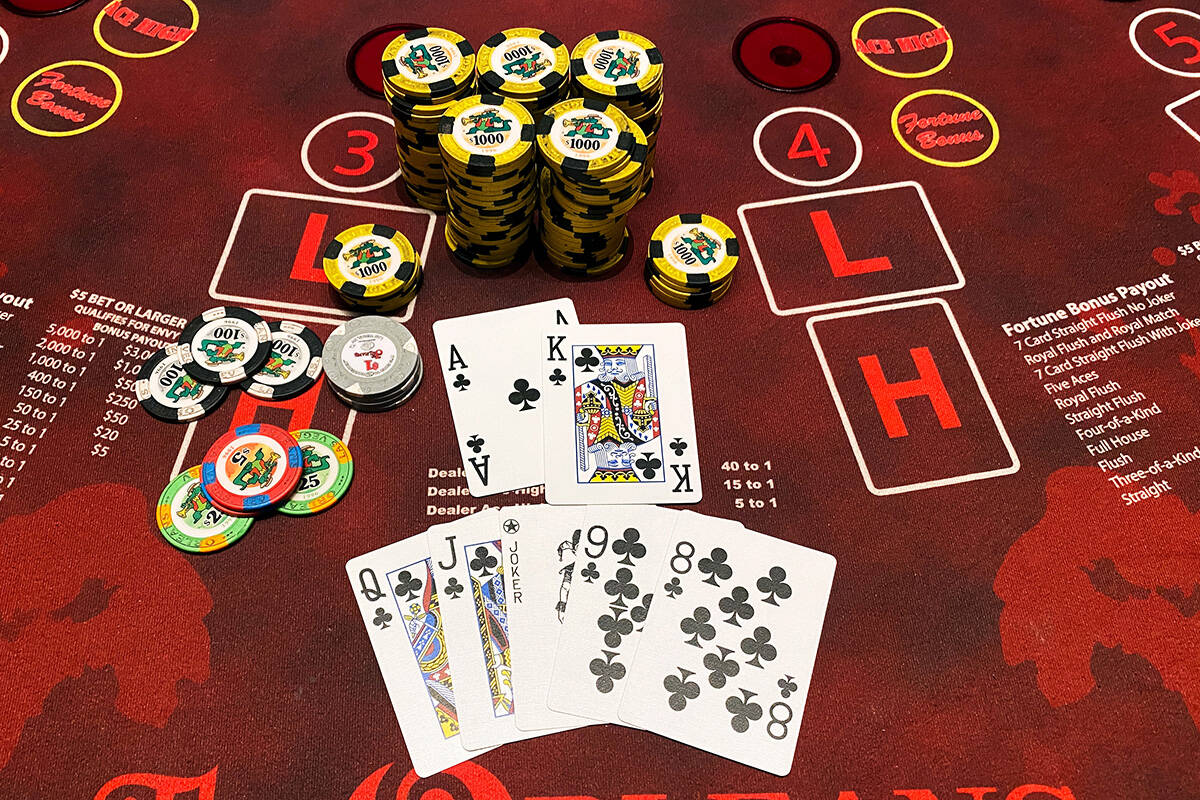 Playing Face Up Pai Gow Poker table at The Orleans, a player hit a seven-card straight flush (e ...