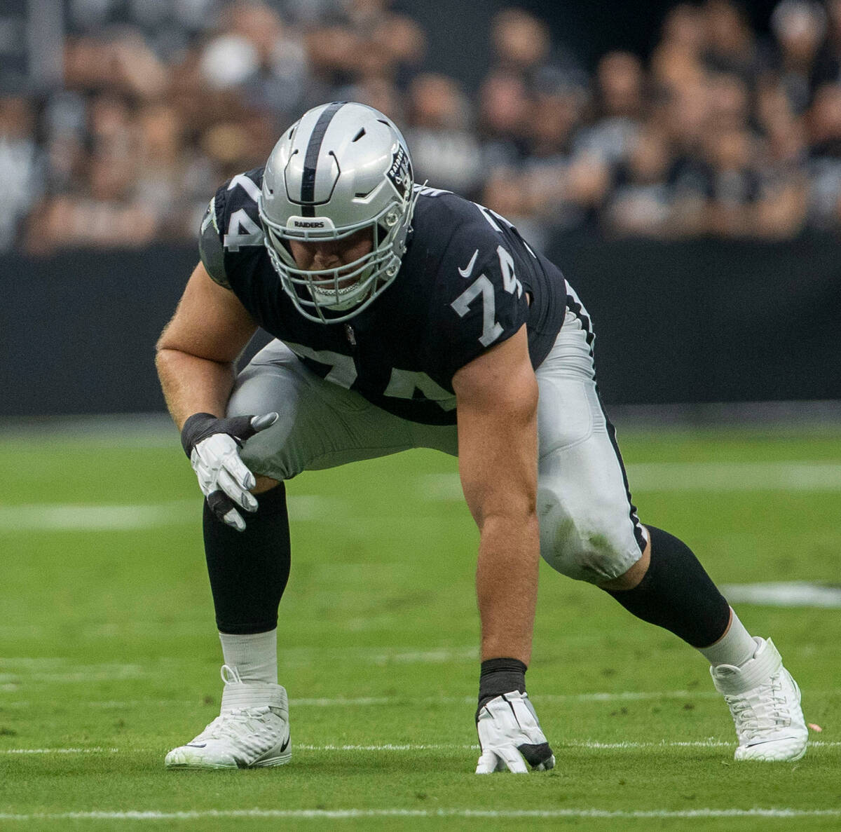 Raiders offensive tackle Kolton Miller (74) sets up on the line of scrimmage during the first h ...