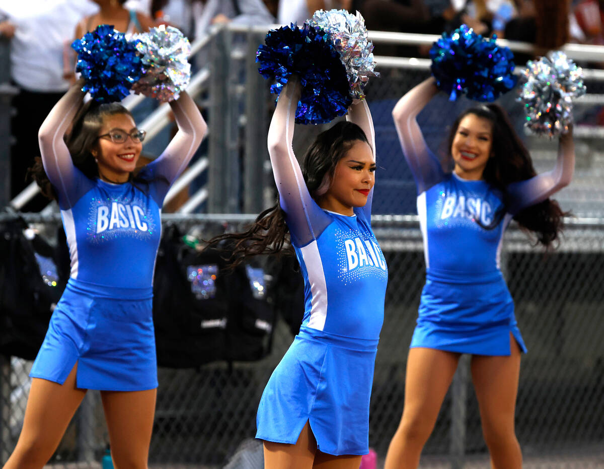 Basic High School cheerleaders perform during a football game against Basic High School, on Fri ...