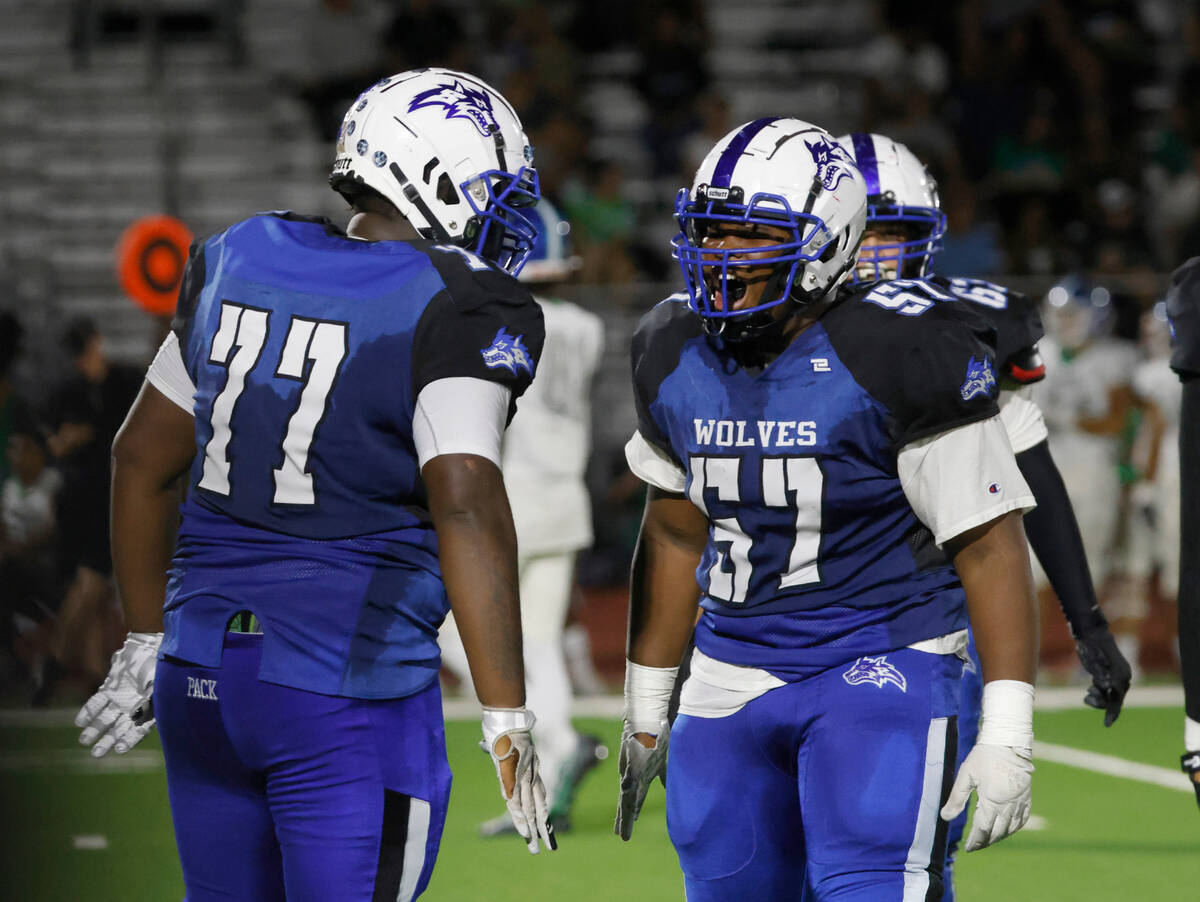 Basic High's Antoine Taylor jr. (57) reacts after making a play during the second half of a foo ...