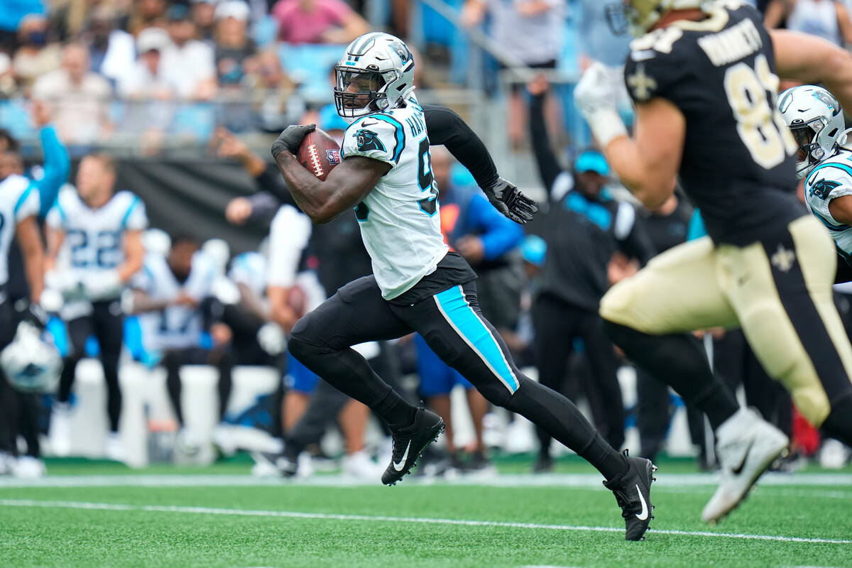 Carolina Panthers defensive end Marquis Haynes Sr. (98) recovers a fumble and runs in for a tou ...