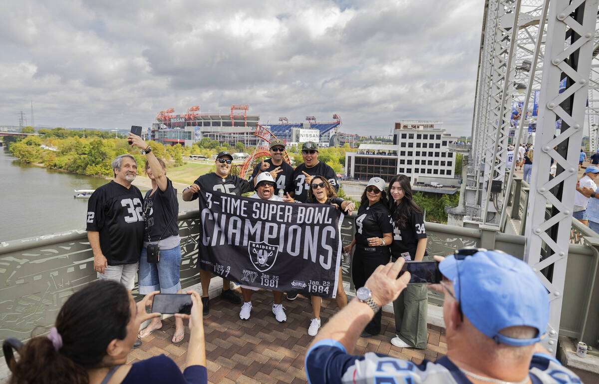 Raiders fans outside Nissan Stadium in Nashville, Tenn. before the start of an NFL football gam ...