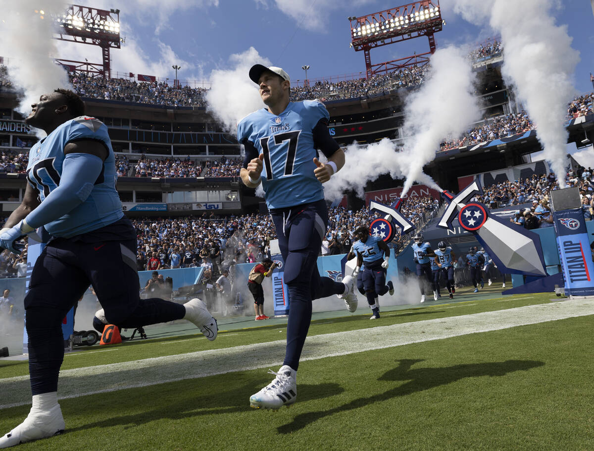 Tennessee Titans quarterback Ryan Tannehill (17) takes the field before the start of an NFL foo ...