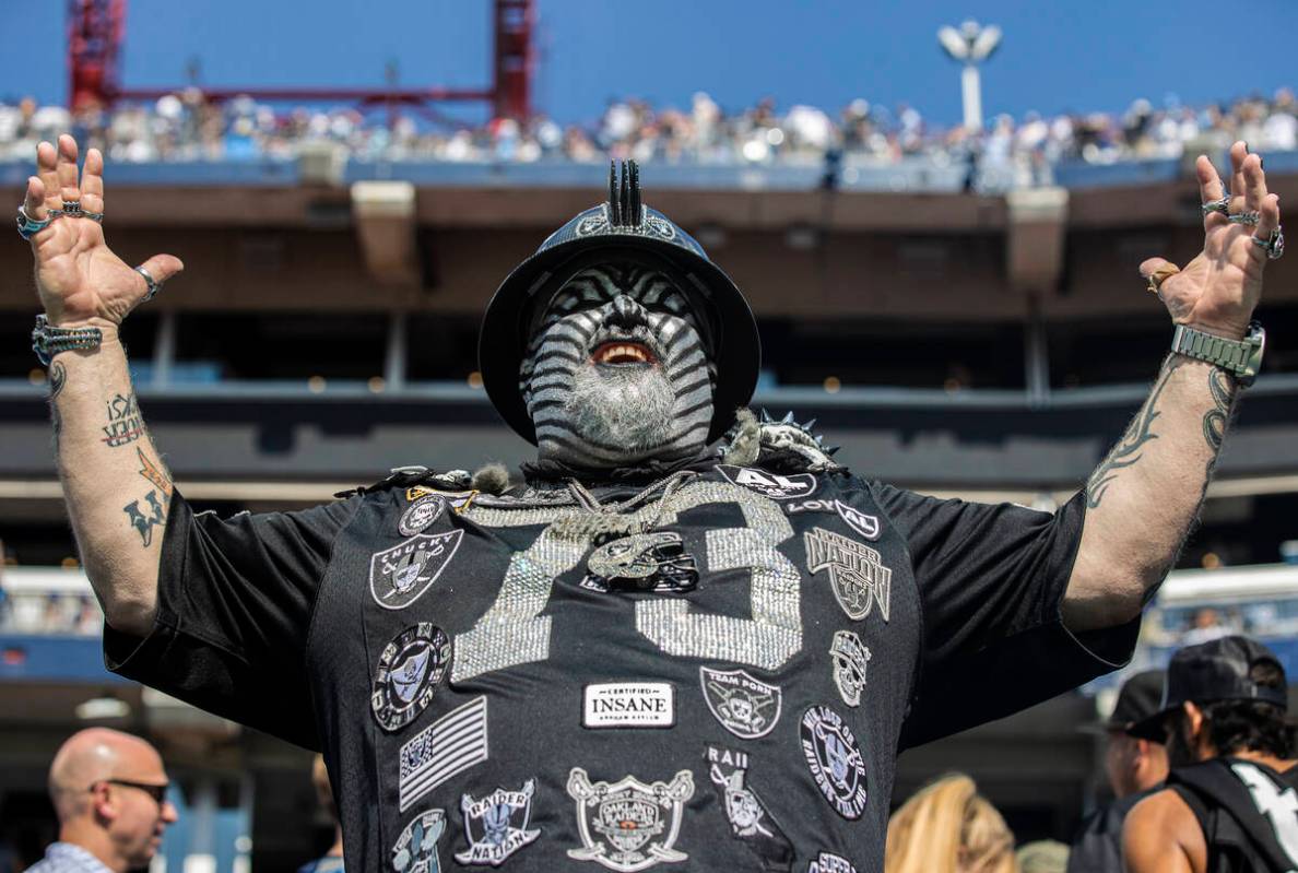 Hollwood Raider throws his arms up in frustration during an NFL football game against the Tenne ...