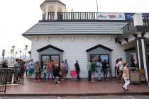 People line up for lottery tickets at the Primm Valley Lotto Store on the Nevada-California bor ...