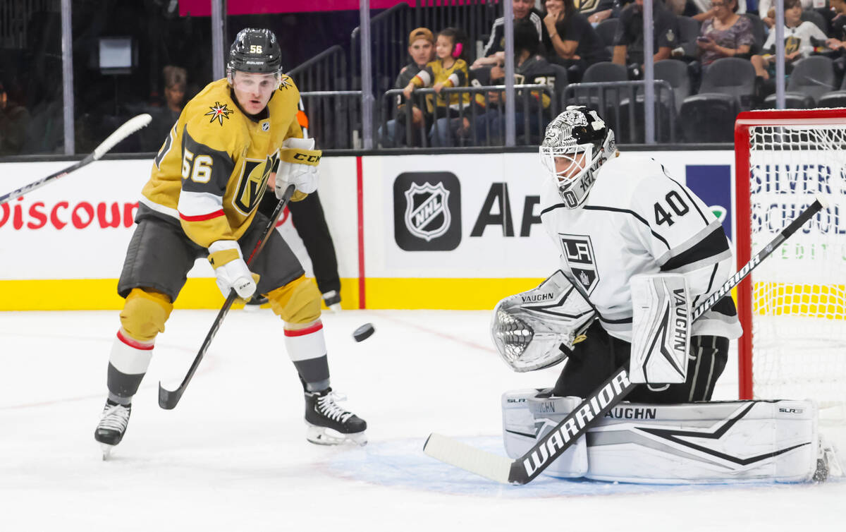 Los Angeles Kings goaltender Cal Petersen (40) looks to stop a shot in front of Golden Knights ...