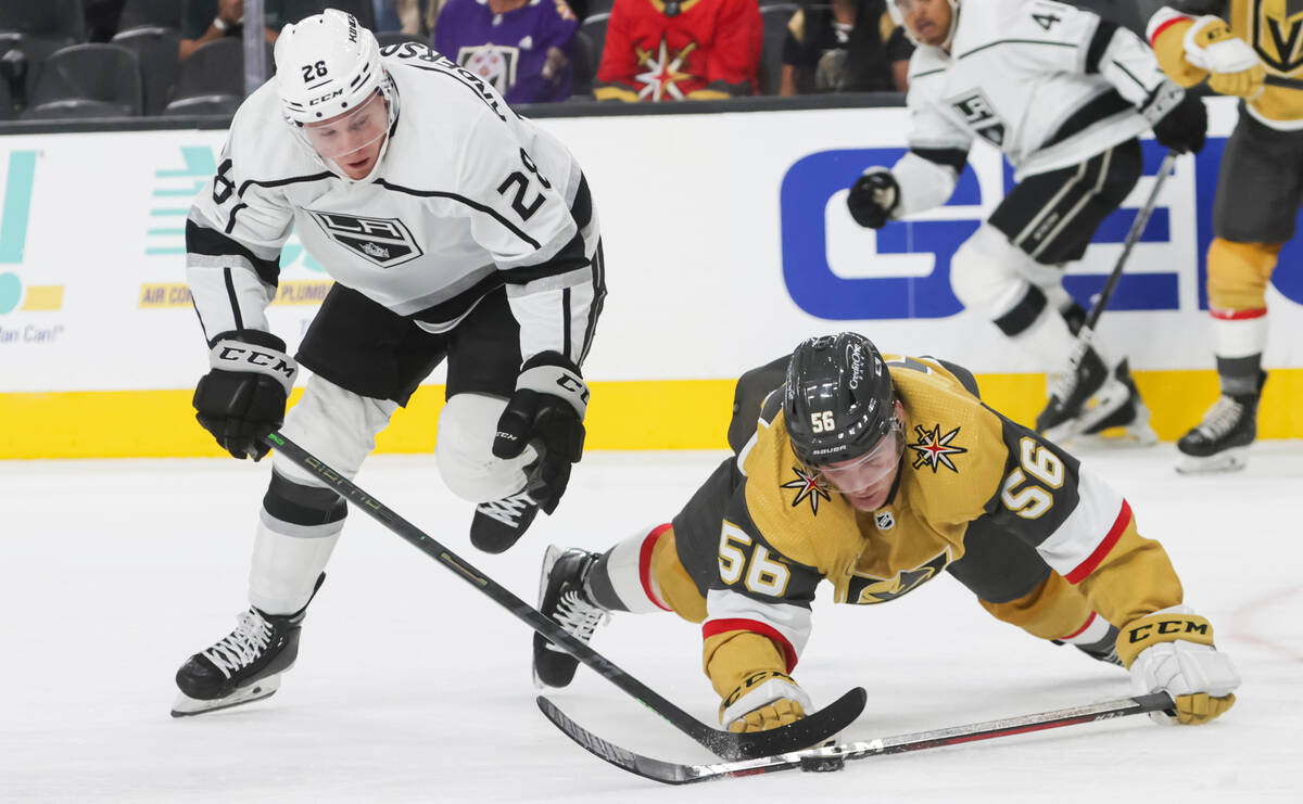 Golden Knights right wing Sheldon Rempal (56) gets tripped up in front of Los Angeles Kings def ...