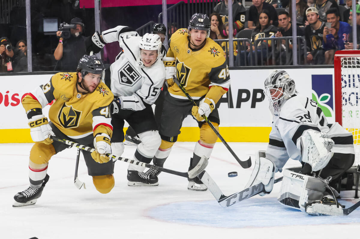 Golden Knights center Paul Cotter (43) shoots the puck as Los Angeles Kings goaltender Pheonix ...