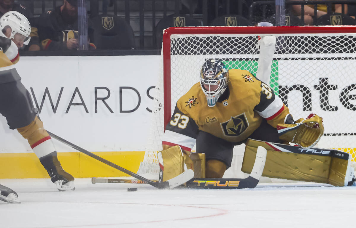 Golden Knights goaltender Adin Hill (33) stops the puck against the Los Angeles Kings during th ...