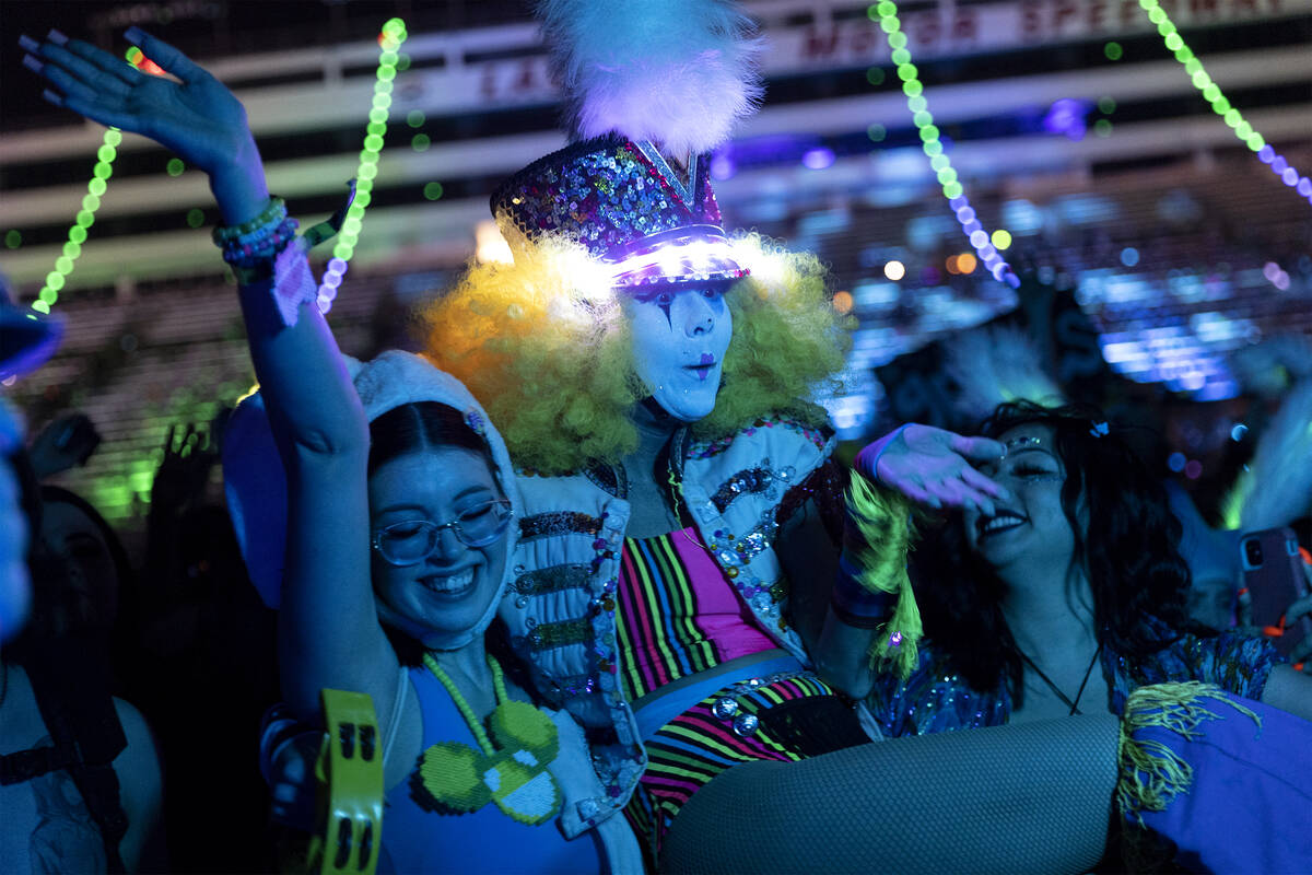 A Carnevale Clown performer interacts with the crowd at Grimes DJ set during the second day of ...