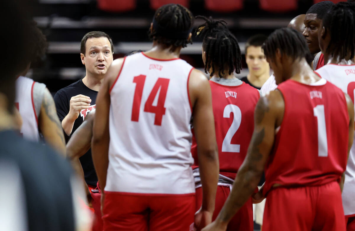 UNLV basketball coach Kevin Kruger interacts with his players during practice at Thomas & M ...