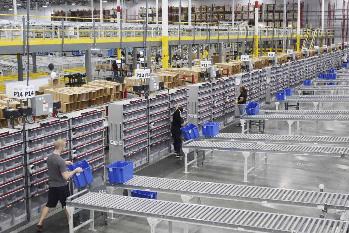 Warehouse associate assistants sort product at the Sephora Distribution Center, a 714,000-squar ...