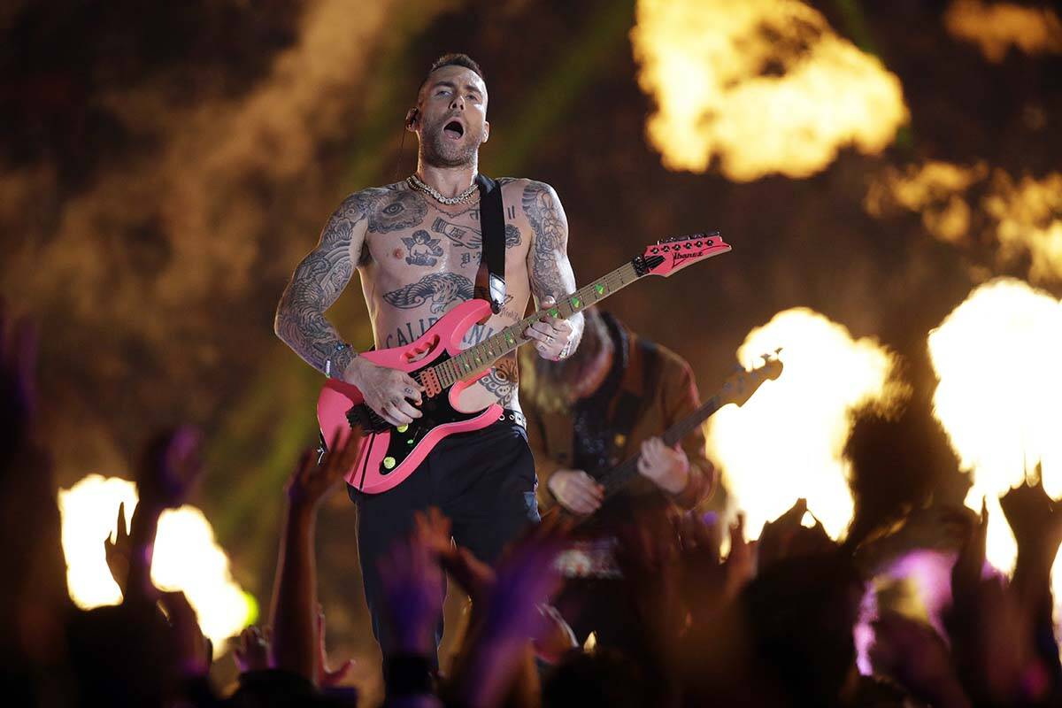 Adam Levine of Maroon 5 performs during halftime of the NFL Super Bowl 53 football game between ...