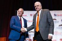 Gov. Steve Sisolak, right, and Sheriff Joseph Lombardo shake hands after meeting with the const ...