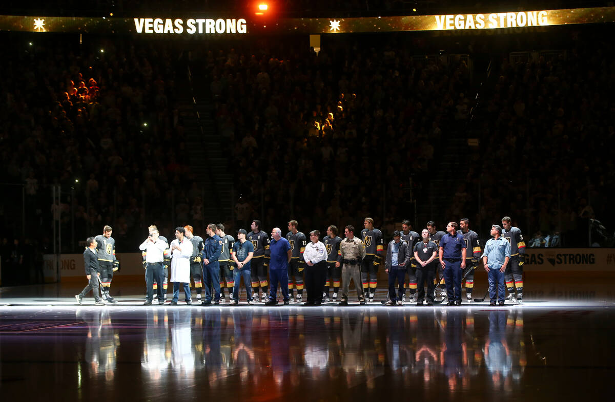 Members of the Vegas Golden Knights are introduced with first responders before playing the Ari ...
