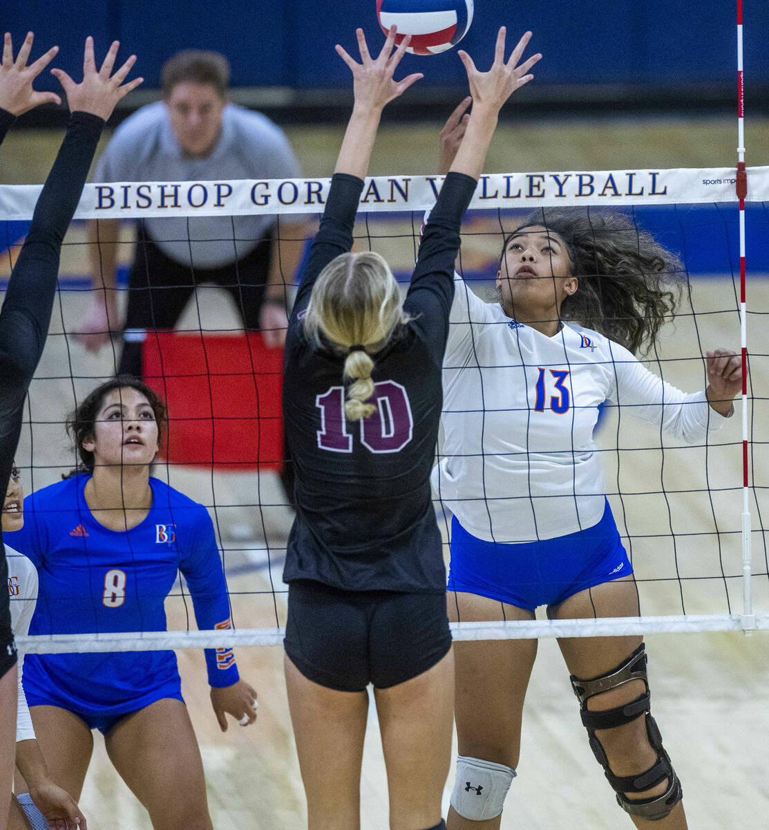 Bishop Gorman's Aliitasi Fakatoumafi (13) tips the ball over the fingers of Faith Lutheran's El ...