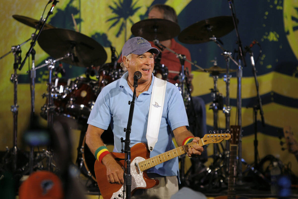 Singer Jimmy Buffett performs during the renaming event of the Miami Dolphins NFL football stad ...