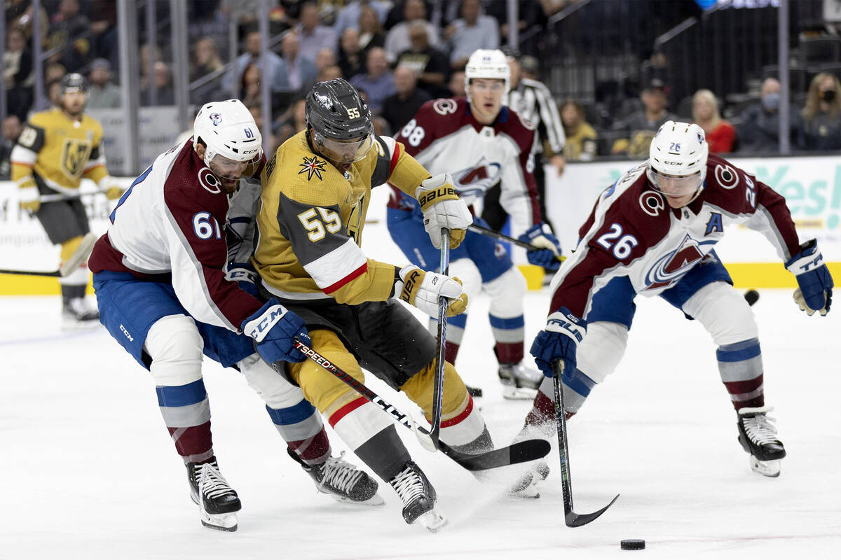 Golden Knights right wing Keegan Kolesar (55) skates against Avalanche forward Martin Kaut (61) ...