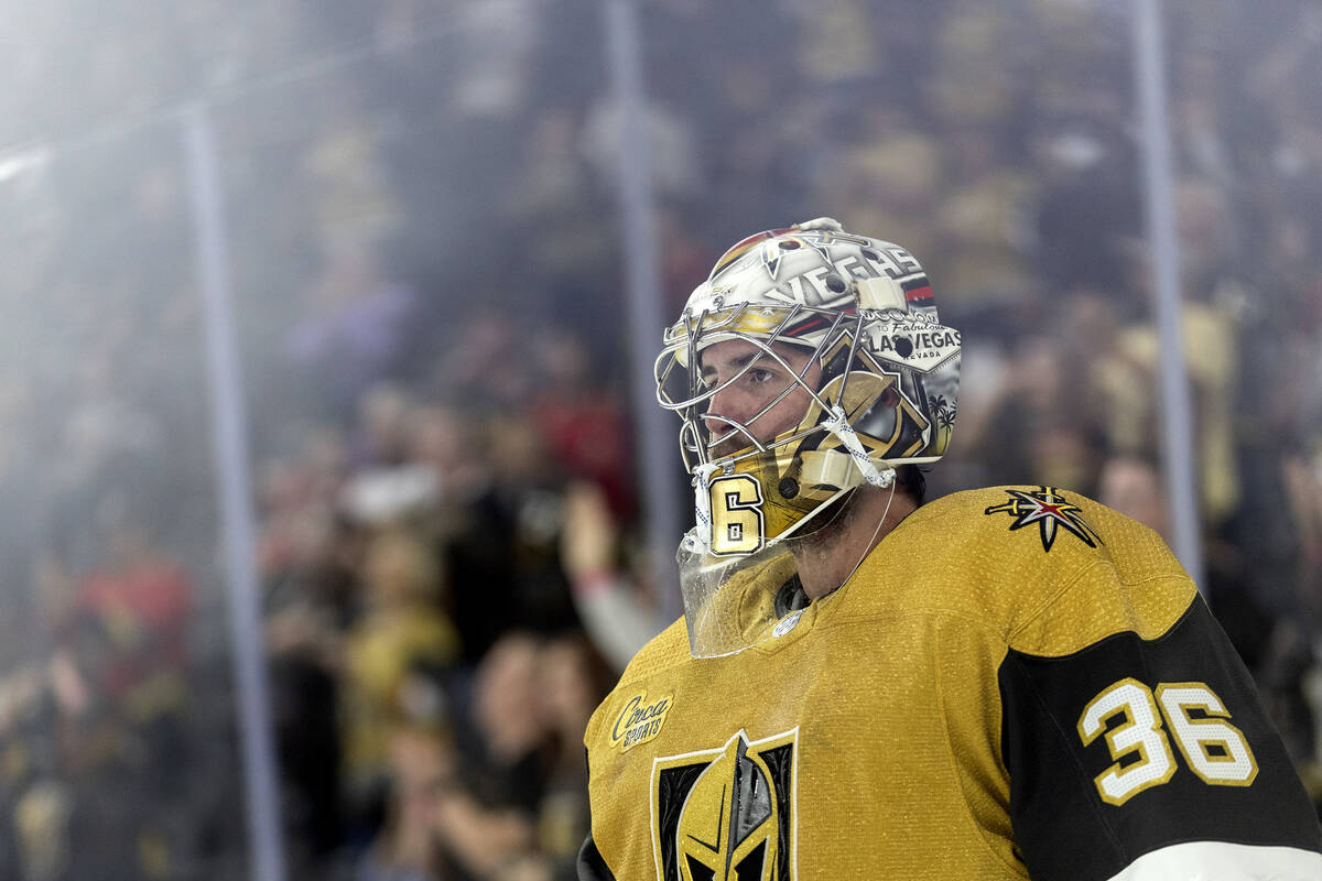 Golden Knights goaltender Logan Thompson (36) skates around the net during the second period of ...