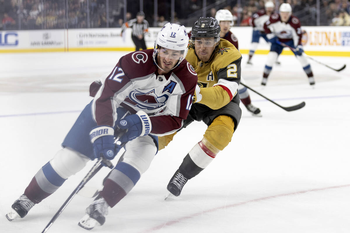 Golden Knights defenseman Zach Whitecloud (2) skates against Avalanche forward Jayson Megna (12 ...
