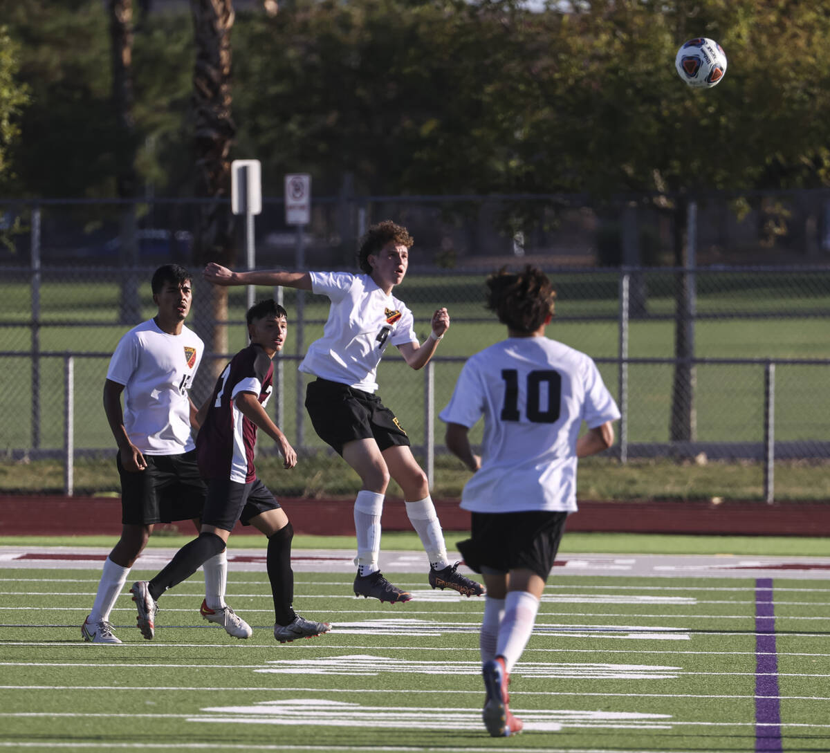 Las Vegas' Victor Mateo (4) heads the ball during a soccer game at Cimarron-Memorial High Schoo ...