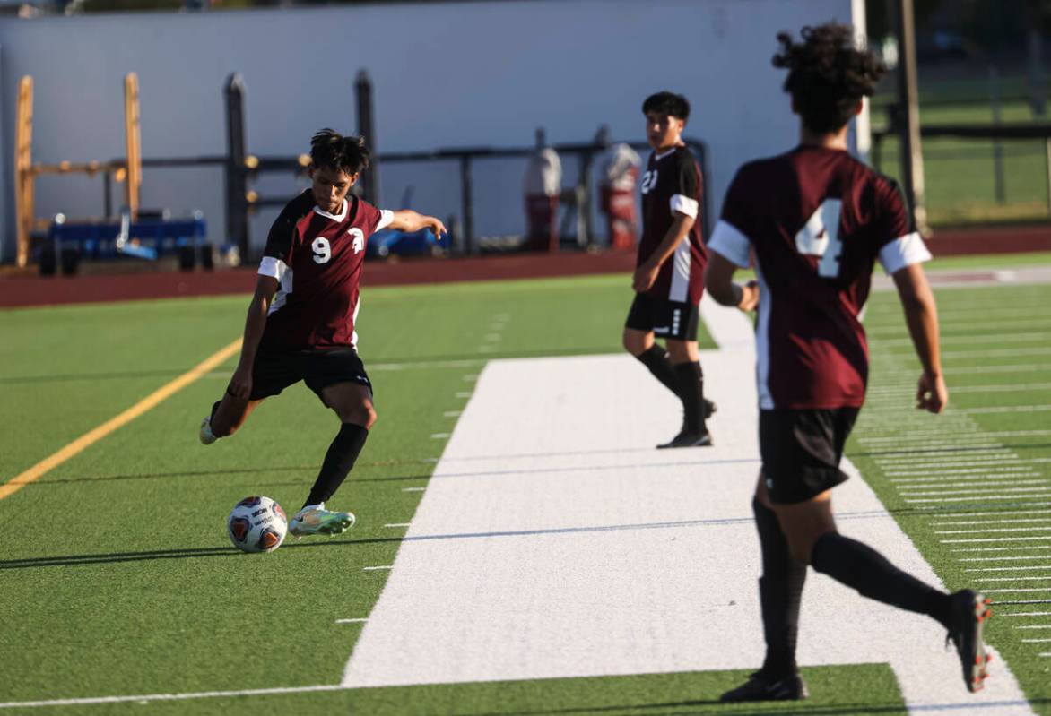 Cimarron-Memorial's Gio Rojas (9) kicks the ball during a soccer game against Las Vegas at Cima ...