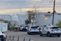 FILE - Police investigate a homicide Tuesday, Aug. 9, 2022, at Desert Garden Condominiums, 1720 ...