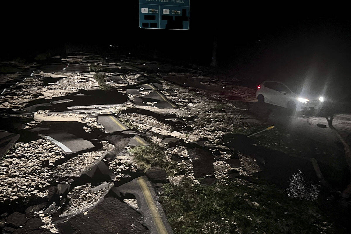 The pavement just before the causeway to Sanibel is damage by a storm surge from Hurricane Ian ...