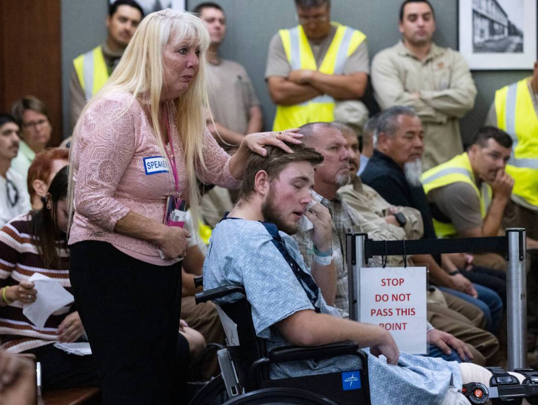 Carmen McGowan consoles her son Riley during Danielle Kove's sentencing at the Regional Justice ...