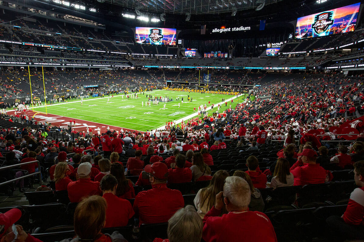 The Wisconsin Badgers fan section looks out on the field at Allegiant Stadium before the Las Ve ...