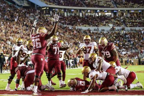 Florida State running back Lawrance Toafili (9) runs the ball in for a touchdown during the fir ...