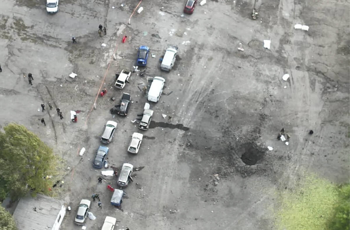 In this image released by the Police Press Service, the view from a drone shows the site of a R ...