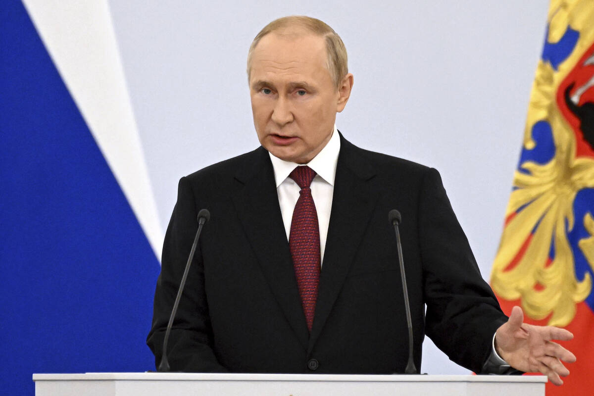 Russian President Vladimir Putin speaks during celebrations marking the incorporation of region ...