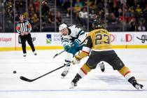 San Jose Sharks forward Luke Johnson (76) passes the puck against Vegas Golden Knights defensem ...