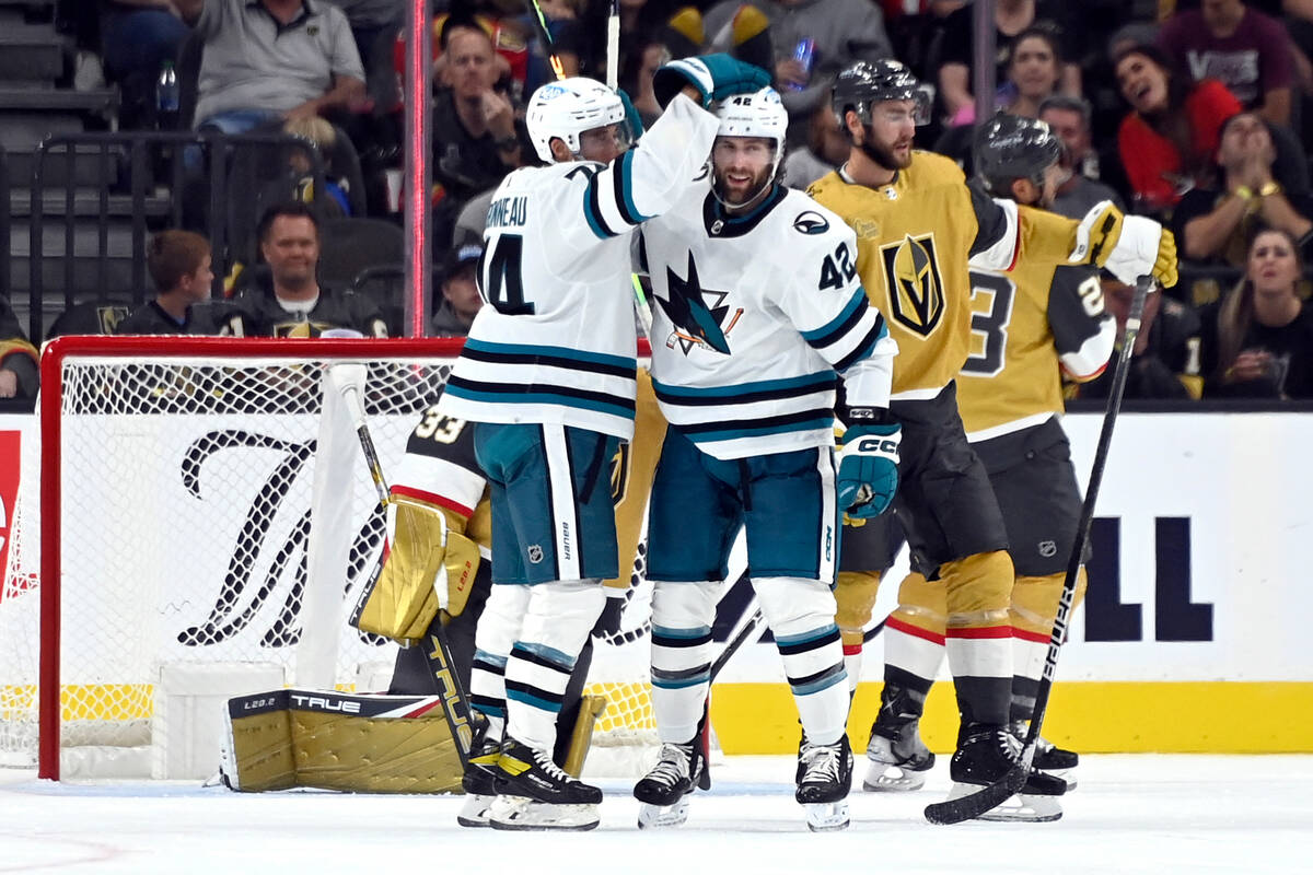 San Jose Sharks right wing Max Veronneau (14) and left wing Jonah Gadjovich celebrate Gadjovich ...
