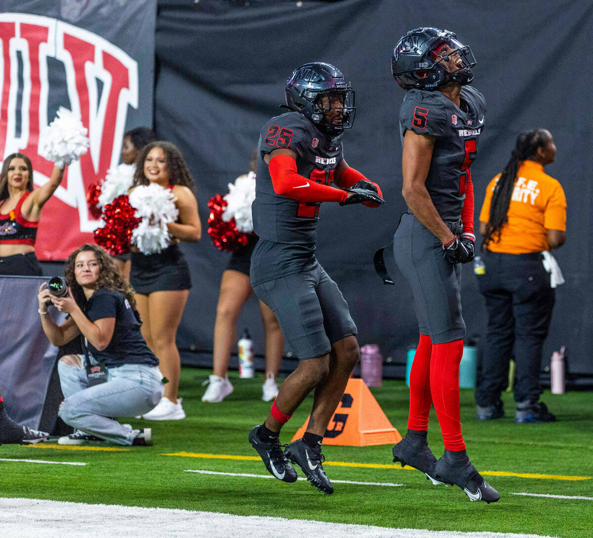 UNLV Rebels defensive back Cameron Oliver (5) celebrates for a late score after an interception ...