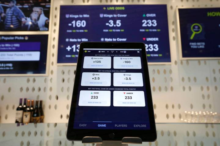 FILE - In this March 19, 2019, file photo, an iPad displays the types of free bets that could b ...