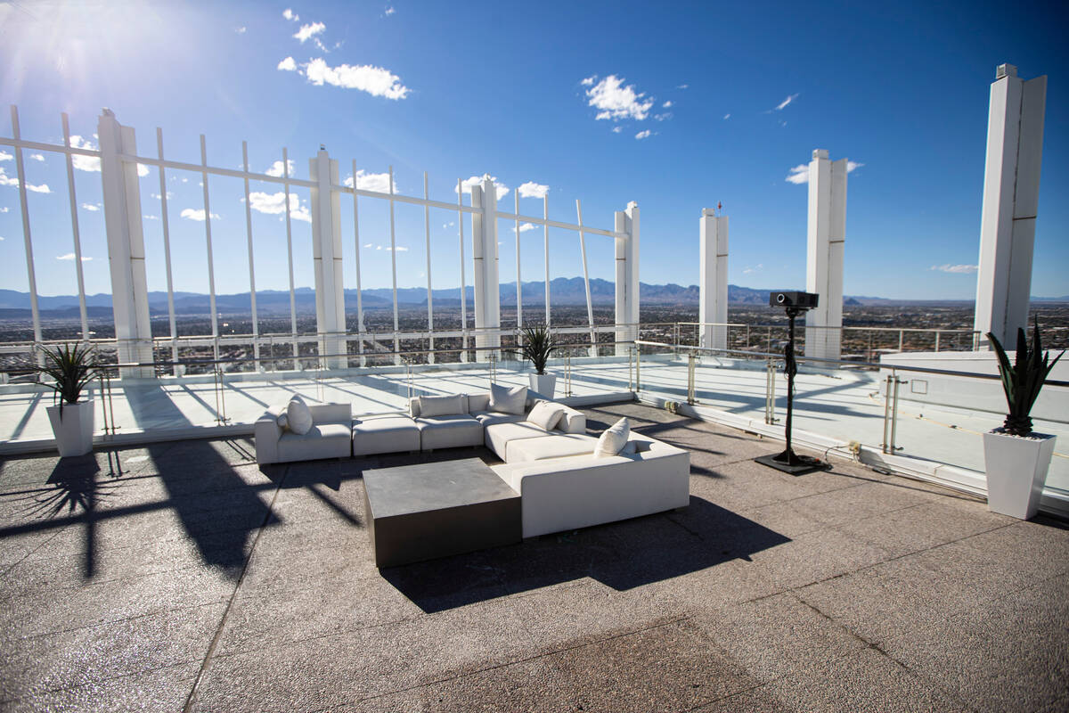 Views from the rooftop patio are seen at the Palms Place penthouse locator on the entire top fl ...