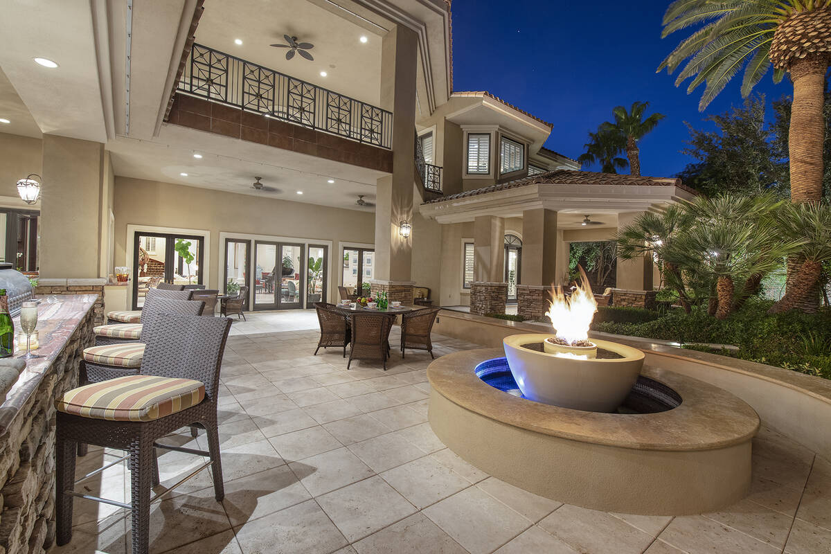 The patio has fire features. (Corcoran Global Living)