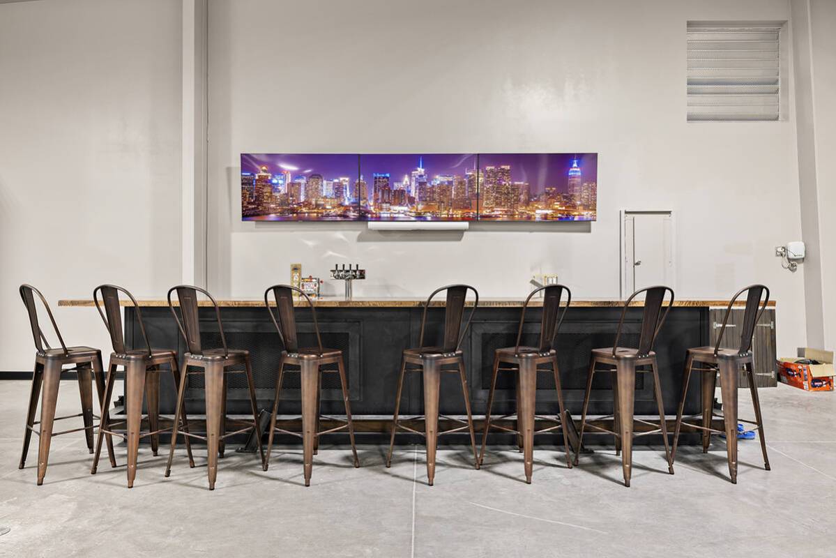 The 5,000-square-foot ultimate garage features a full bar. (Napoli Group)