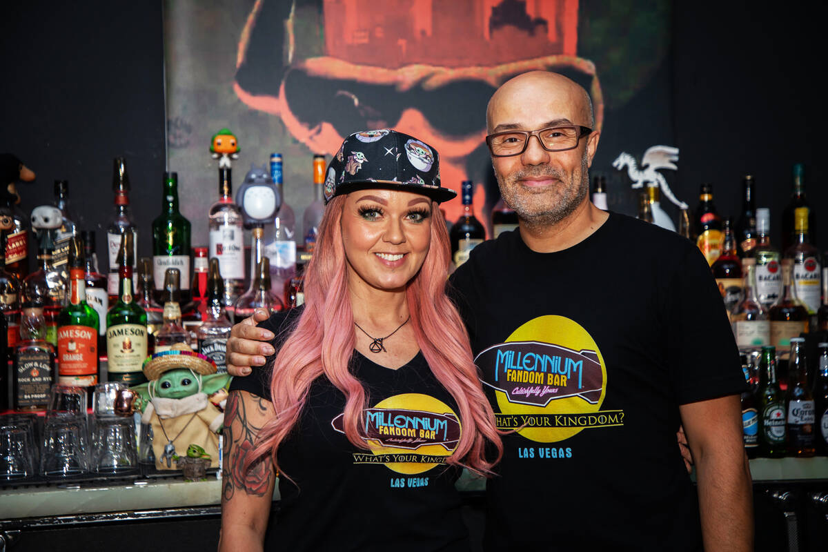 Linda Biamonte, left, and Alex Pusineri, right, pose for a portrait at the Millenium Fandom Bar ...