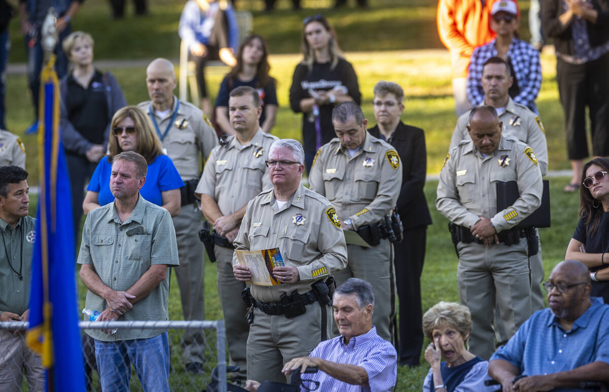 Metro chiefs and officers join others during the Sunrise Remembrance Ceremony remembering the R ...