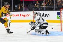 Golden Knights center Jack Eichel (9) scores a goal past Los Angeles Kings goaltender Cal Peter ...