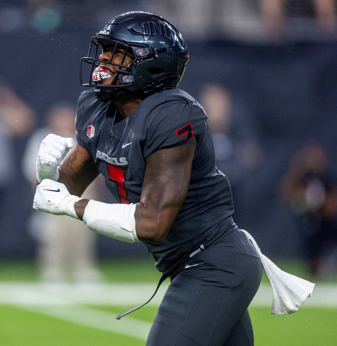 UNLV Rebels defensive lineman Adam Plant Jr. (7) is pumped after another defensive stop of the ...