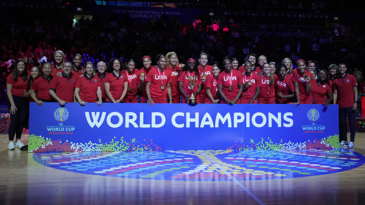 Gold medalists the United States pose for photo after defeating China in the final at the women ...