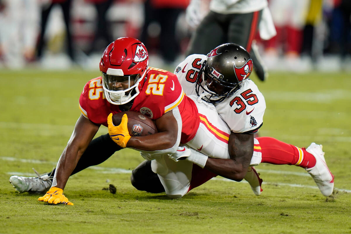 Tampa Bay Buccaneers cornerback Jamel Dean (35) tackles Kansas City Chiefs running back Clyde E ...