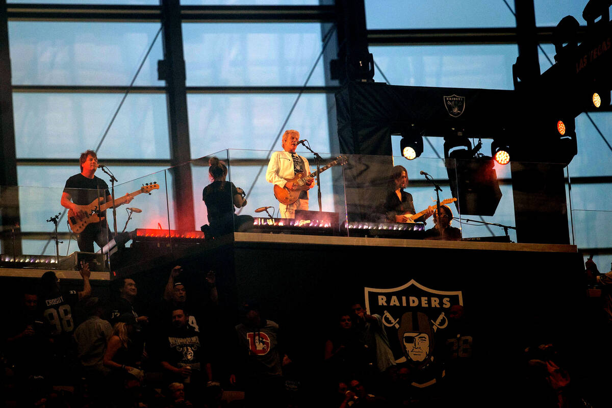 Don Felder performs during halftime of an NFL game between the Raiders and the Denver Broncos a ...